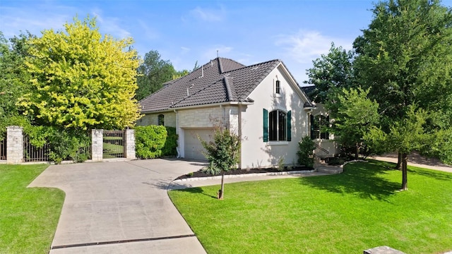 view of home's exterior with driveway, stucco siding, a gate, a garage, and a tile roof