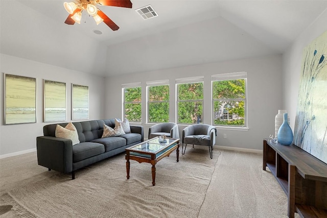 living room with lofted ceiling, light carpet, baseboards, and a ceiling fan