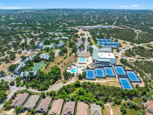 aerial view of property's location with a pool