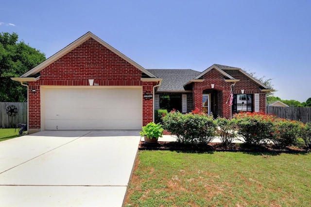 866 Bella Vista Cir, Kyle, TX 78640 - view of front facade featuring brick siding, an attached garage, concrete driveway, and roof with shingles