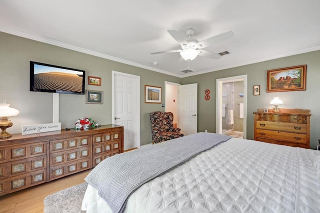 866 Bella Vista Cir, Kyle, TX 78640 - bedroom featuring crown molding, light wood-style flooring, a ceiling fan, and ensuite bathroom