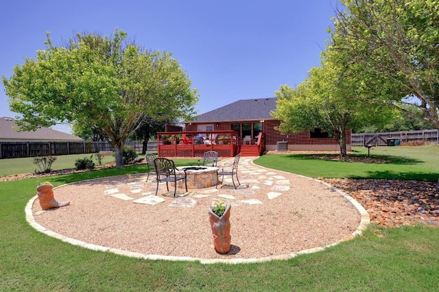 866 Bella Vista Cir, Kyle, TX 78640 - view of yard with an outdoor fire pit, a deck, and a patio