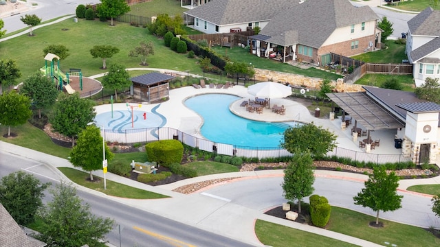 1012 Swan Flower St, Leander, TX 78641 - aerial perspective of suburban area featuring a pool area