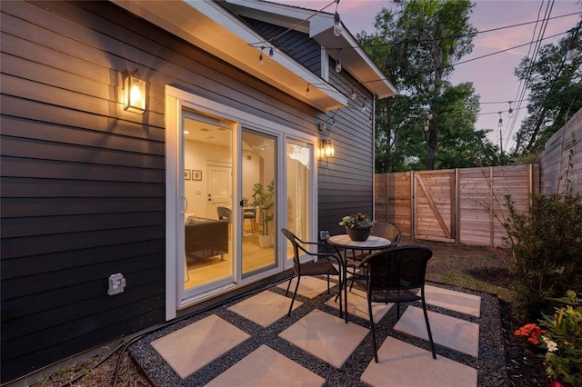 7812 Mullen Dr Unit 2, Austin, TX 78757 - patio terrace at dusk featuring fence