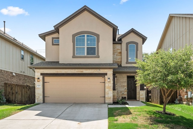 9528 Hunter Ln, Austin, TX 78748 - traditional home featuring stone siding, an attached garage, stucco siding, and concrete driveway