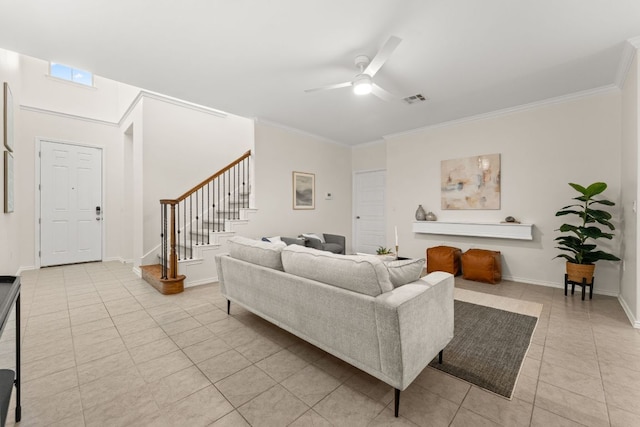 9528 Hunter Ln, Austin, TX 78748 - living area featuring light tile patterned floors, stairway, ceiling fan, crown molding, and baseboards