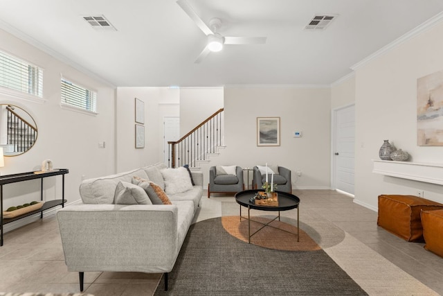9528 Hunter Ln, Austin, TX 78748 - living room featuring stairway, light tile patterned floors, crown molding, a ceiling fan, and baseboards