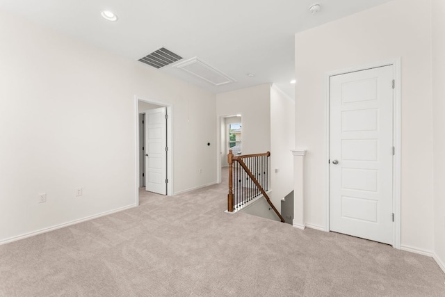 9528 Hunter Ln, Austin, TX 78748 - carpeted spare room featuring attic access, baseboards, a smoke detector, and recessed lighting