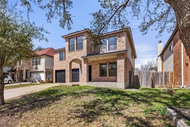 2003 Carriage Club Dr, Cedar Park, TX 78613 - view of front of home with concrete driveway, an attached garage, and brick siding