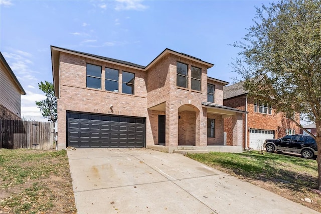 2003 Carriage Club Dr, Cedar Park, TX 78613 - view of front of house featuring an attached garage, brick siding, and concrete driveway