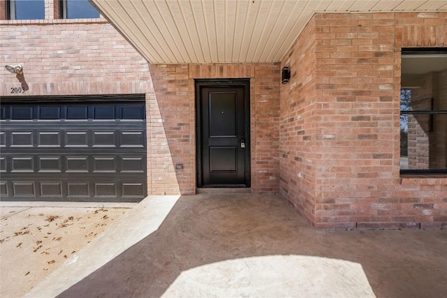 2003 Carriage Club Dr, Cedar Park, TX 78613 - entrance to property with brick siding and an attached garage