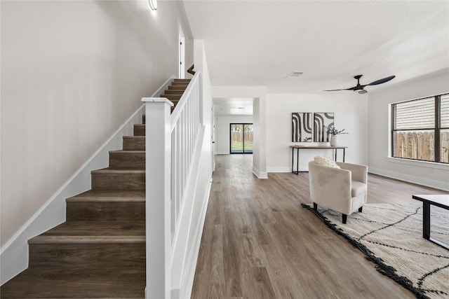 2003 Carriage Club Dr, Cedar Park, TX 78613 - stairway with wood finished floors and a ceiling fan