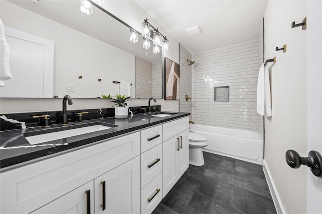 2003 Carriage Club Dr, Cedar Park, TX 78613 - bathroom featuring double vanity, toilet, shower / tub combination, and baseboards