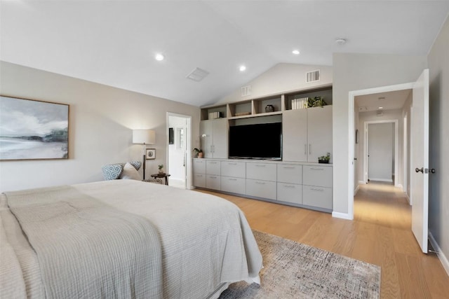 8900 Rockcrest Dr, Austin, TX 78759 - bedroom featuring vaulted ceiling, light wood-style floors, baseboards, and recessed lighting