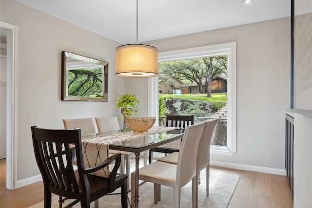 8900 Rockcrest Dr, Austin, TX 78759 - dining space featuring light wood finished floors and baseboards