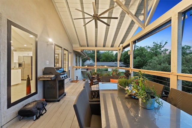 8900 Rockcrest Dr, Austin, TX 78759 - wooden terrace with a grill, ceiling fan, and outdoor dining area