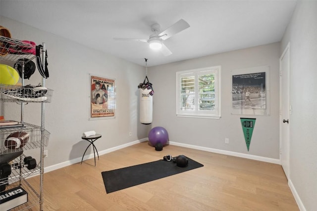 8900 Rockcrest Dr, Austin, TX 78759 - workout area with wood finished floors, ceiling fan, and baseboards