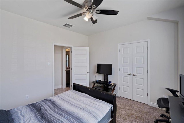 bedroom with a desk, a ceiling fan, and carpet