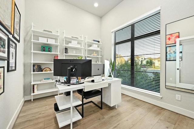 16708 Rakesh Way, Manor, TX 78653 - office with baseboards, light wood finished floors, and recessed lighting