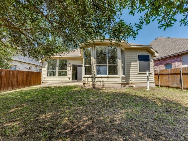 back of property featuring a patio