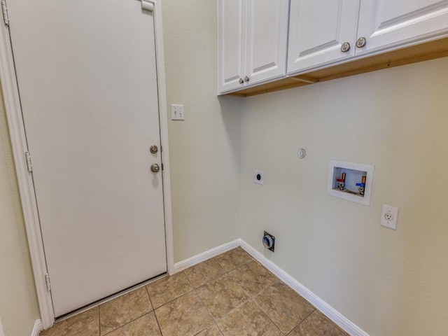 laundry room with hookup for an electric dryer, washer hookup, cabinet space, baseboards, and gas dryer hookup