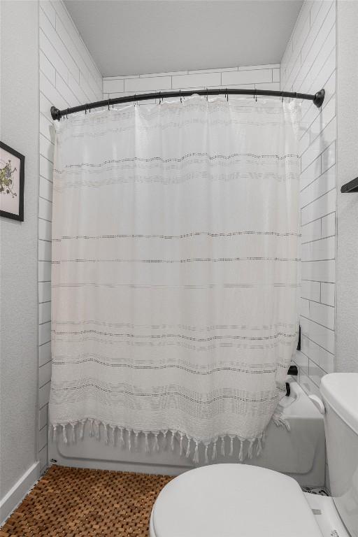 5308 Evans Ave Unit 2, Austin, TX 78751 - bathroom featuring toilet and shower / bath combo