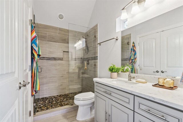 906 Linden St Unit A, Austin, TX 78702 - bathroom featuring vanity, a shower stall, and toilet