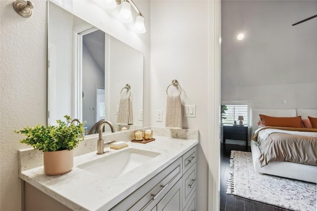 906 Linden St Unit A, Austin, TX 78702 - bathroom with vanity, wood finished floors, and ensuite bath