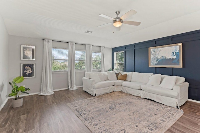 1116 Brenham Ln, Leander, TX 78641 - living room with a ceiling fan, baseboards, and wood finished floors