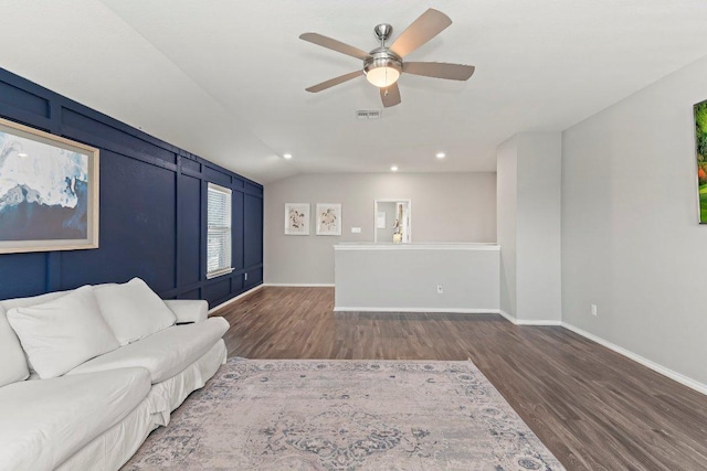 1116 Brenham Ln, Leander, TX 78641 - living room featuring wood finished floors, ceiling fan, baseboards, recessed lighting, and vaulted ceiling