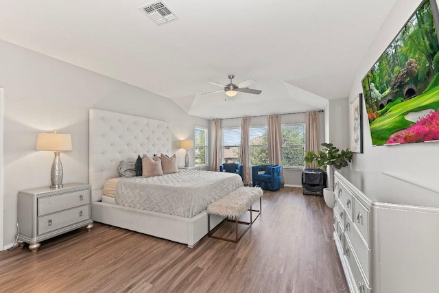 1116 Brenham Ln, Leander, TX 78641 - bedroom featuring lofted ceiling, wood finished floors, a ceiling fan, and baseboards