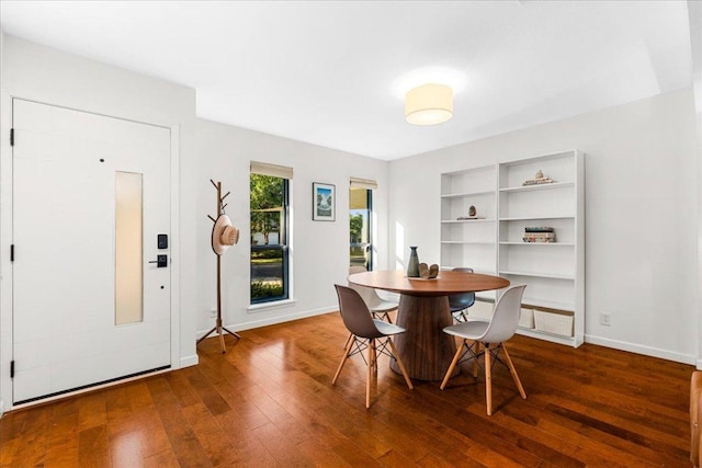 6905 Whispering Oaks Dr, Austin, TX 78745 - dining area with hardwood / wood-style flooring and baseboards
