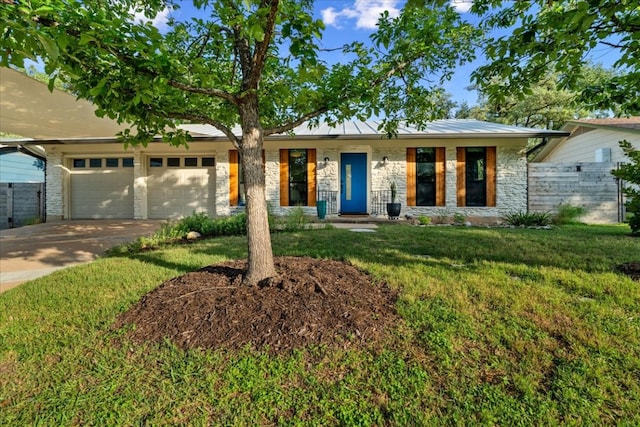 6905 Whispering Oaks Dr, Austin, TX 78745 - single story home featuring an attached garage, concrete driveway, a front yard, and stone siding