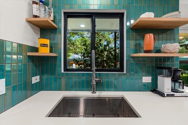 6905 Whispering Oaks Dr, Austin, TX 78745 - kitchen with open shelves, a sink, and tasteful backsplash
