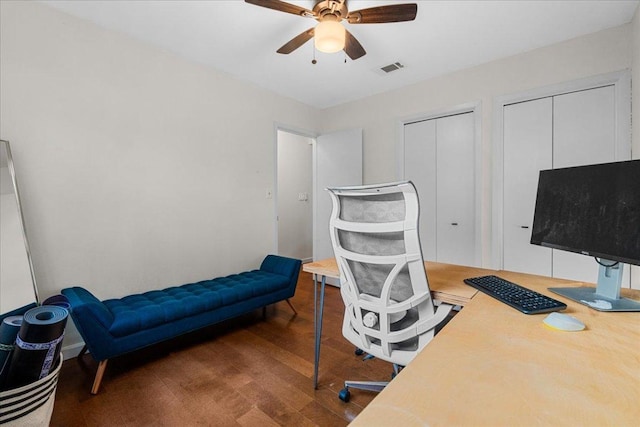 6905 Whispering Oaks Dr, Austin, TX 78745 - home office with ceiling fan and wood finished floors