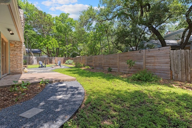 7805 Manassas Dr, Austin, TX 78745 - fenced backyard featuring a patio area