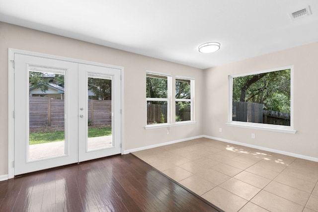 7805 Manassas Dr, Austin, TX 78745 - unfurnished room with french doors and wood finished floors