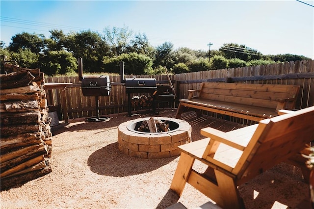 192 Falcon Dr, Luling, TX 78648 - view of patio featuring a fire pit and area for grilling