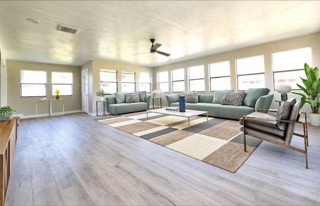 1011 N State Highway 95 N, Bastrop, TX 78602 - living area featuring a ceiling fan and wood finished floors