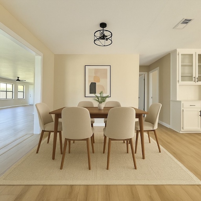 1011 N State Highway 95 N, Bastrop, TX 78602 - dining room featuring light wood-style flooring and baseboards