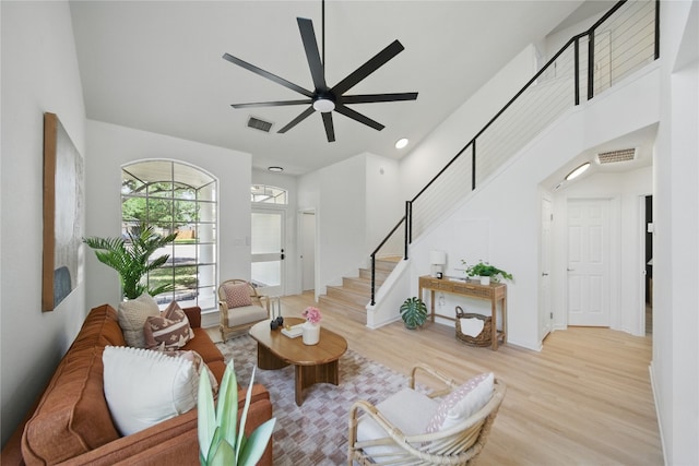 605 Swanson Cv, Austin, TX 78748 - living room with wood finished floors, stairs, a ceiling fan, and recessed lighting