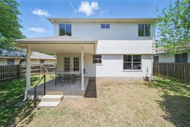 605 Swanson Cv, Austin, TX 78748 - rear view of house featuring french doors, a fenced backyard, and a patio area