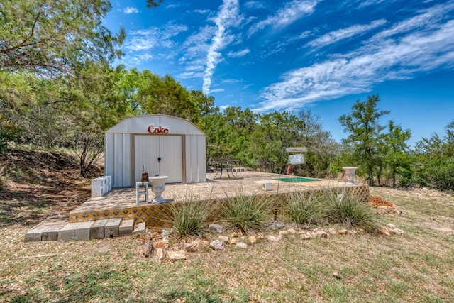 104 Derringer, Horseshoe Bay, TX 78657 - view of yard with a storage shed and an outbuilding