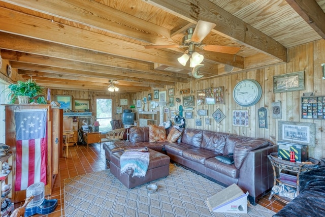 104 Derringer, Horseshoe Bay, TX 78657 - tiled living room with a ceiling fan, wooden ceiling, beamed ceiling, and wood walls