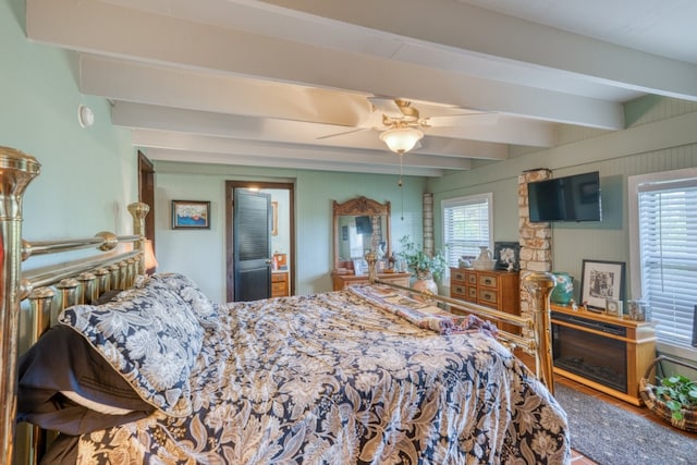 104 Derringer, Horseshoe Bay, TX 78657 - bedroom with beam ceiling and wood finished floors