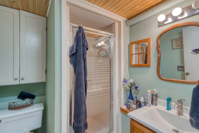 104 Derringer, Horseshoe Bay, TX 78657 - full bathroom featuring a shower stall, toilet, vanity, a textured wall, and wood ceiling