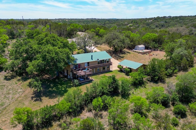 104 Derringer, Horseshoe Bay, TX 78657 - view of subject property with a heavily wooded area
