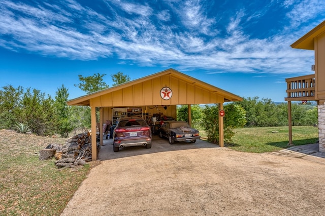 104 Derringer, Horseshoe Bay, TX 78657 - view of parking with driveway and a carport