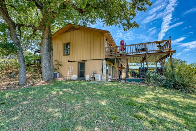 104 Derringer, Horseshoe Bay, TX 78657 - back of house featuring a wooden deck and a yard