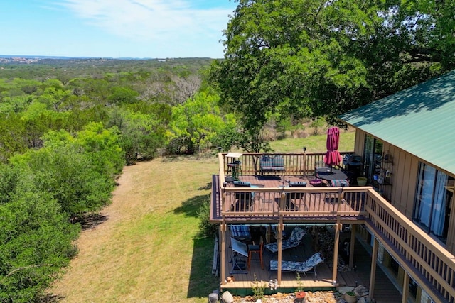 104 Derringer, Horseshoe Bay, TX 78657 - wooden terrace with a lawn and a forest view